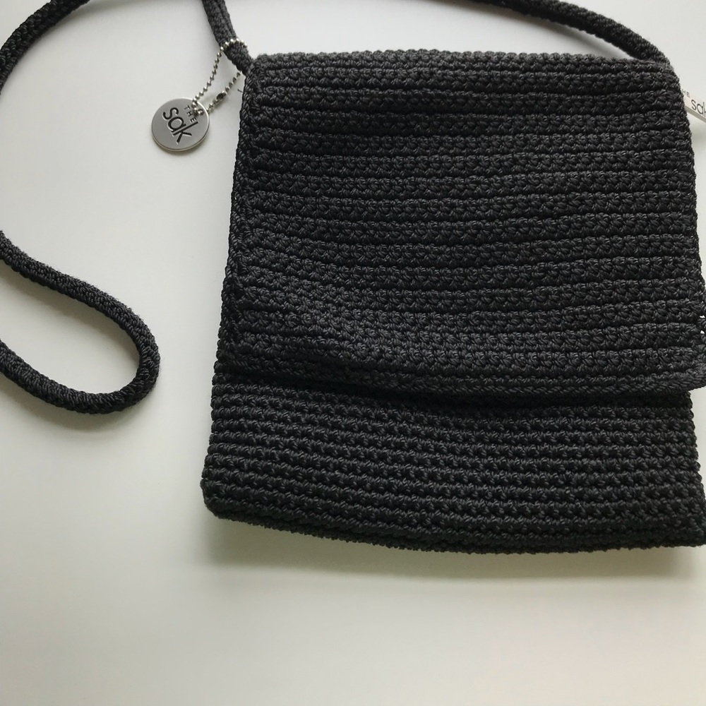 Black crochet side bag by Sak